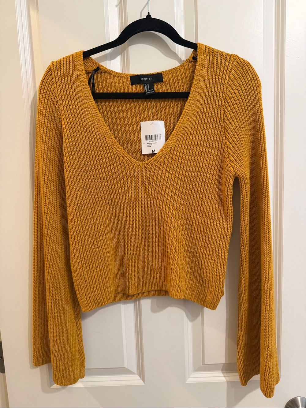 Gold bell sleeve v neck sweater size medium, new with tags
